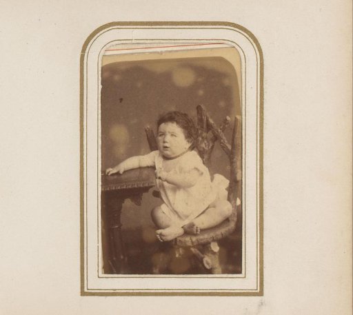 Portrait of a Toddler, Sitting on a Chair