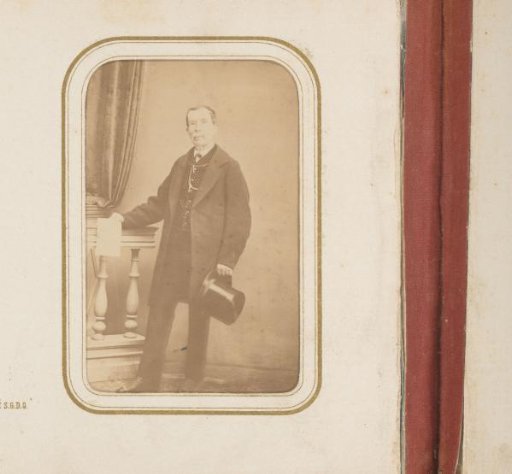 Portrait of a Man Holding a Tall Hat