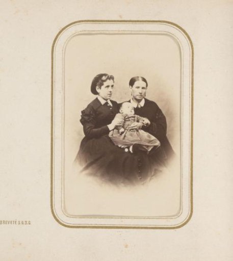 Portrait of two women with a baby