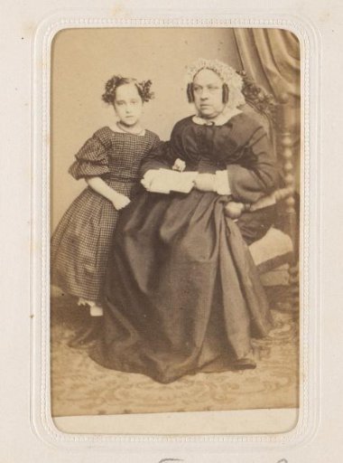 Portrait of a woman and girl in traditional dress