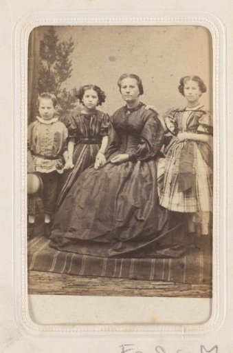 Group portrait of a woman with three children