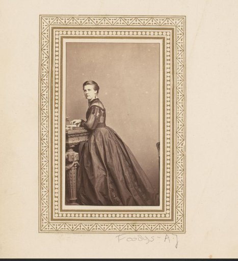 Portrait of a woman by a table
