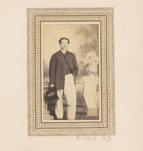 Portrait of a man with a moustache holding a tall hat