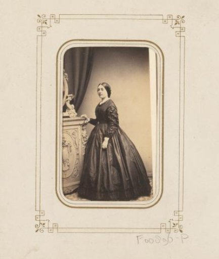 Portrait of a woman by a mirror
