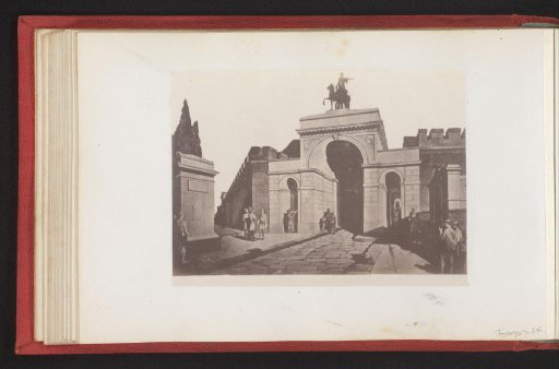 Photographic reproduction of a print depicting a street leading to an arch