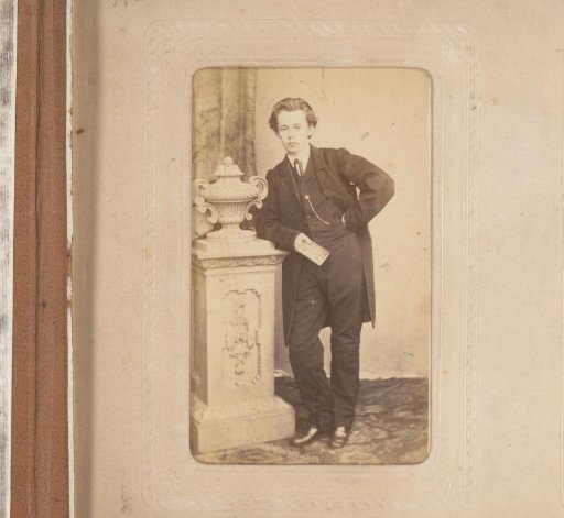Portrait of a Young Man with a Book in His Hand, Leaning on a Pillar with a Vase