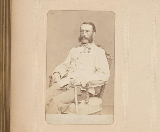 Portrait of a seated man in uniform