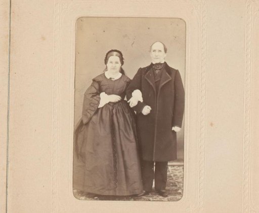 Portrait of an arm-in-arm standing couple