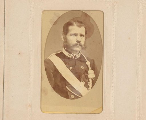 Portrait of a man with a mustache in military uniform