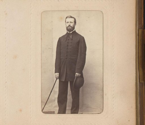 Portrait of a Standing Man with Hat and Walking Stick in Hand