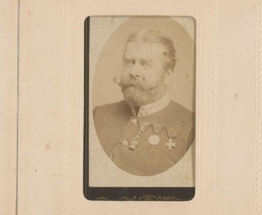 Portrait of a man with a moustache in military uniform