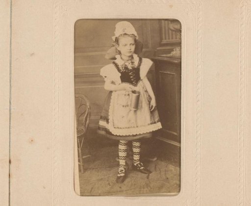 Portrait of a standing girl in traditional dress