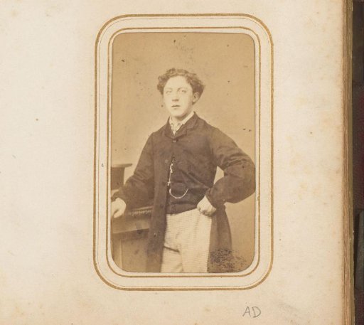 Portrait of a young man with a pocket watch