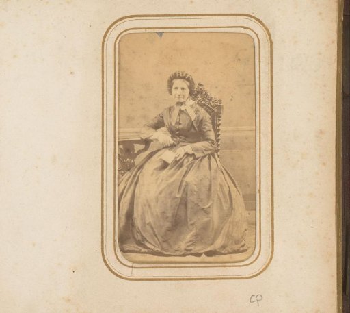 Portrait of an elderly seated woman