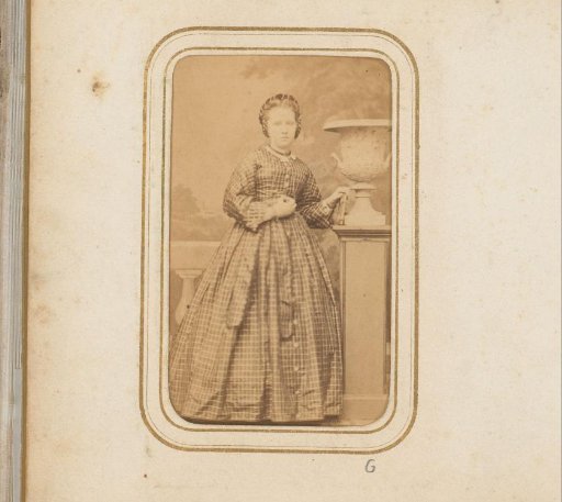 Portrait of a Standing Young Woman with a Book