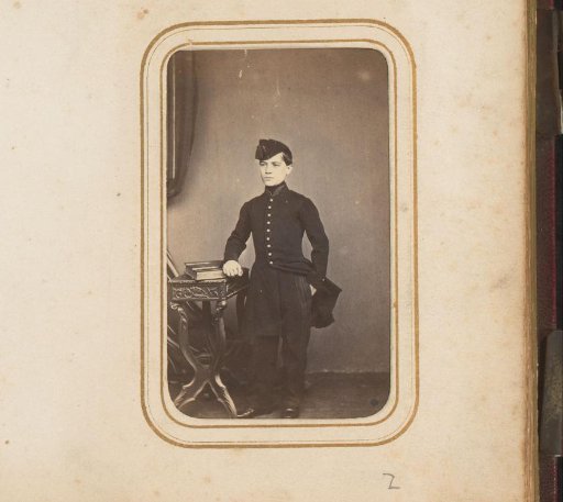 Portrait of a Young Man in Uniform with a Book