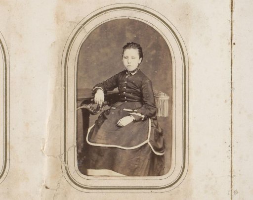Portrait of a seated girl with closed eyes