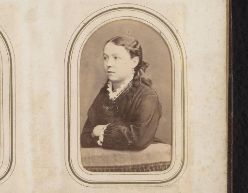 Portrait of a girl leaning on the back of a chair