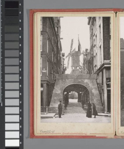 Victory gate with windmill at the beginning of the Gasthuismolensteeg during the April Festivals in 1887 in Amsterdam