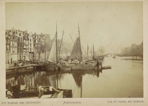 View of the Damrak in a northerly direction, with a ferryboat in the foreground