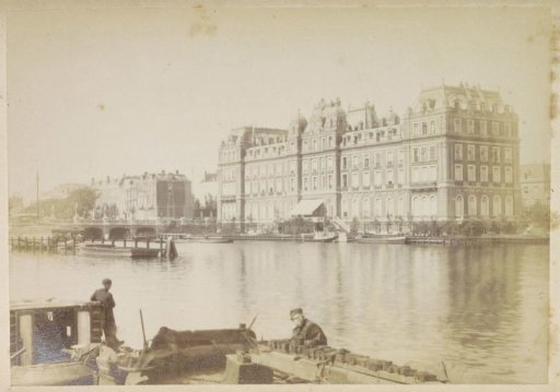 View of the Amstel Hotel with boatmen in the foreground