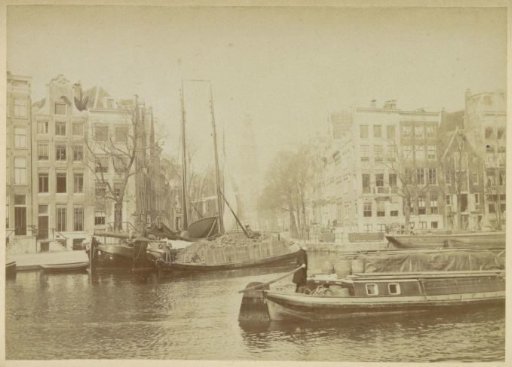 View of the Groenburgwal with Ships in the Foreground