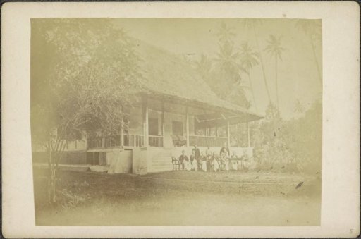 Group posing in front of the house of Mr. Renesse van Duivenbode on Halmahera