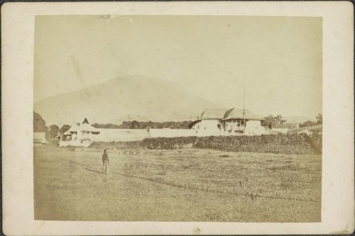 View of the residence of the Sultan of Ternate with the Gunung Gamalama in the background