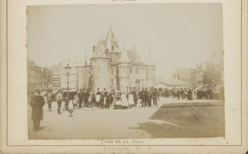 View of the Nieuwmarkt in Amsterdam with the Waag building and onlookers
