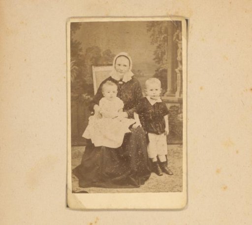 Group portrait with a young woman and two children