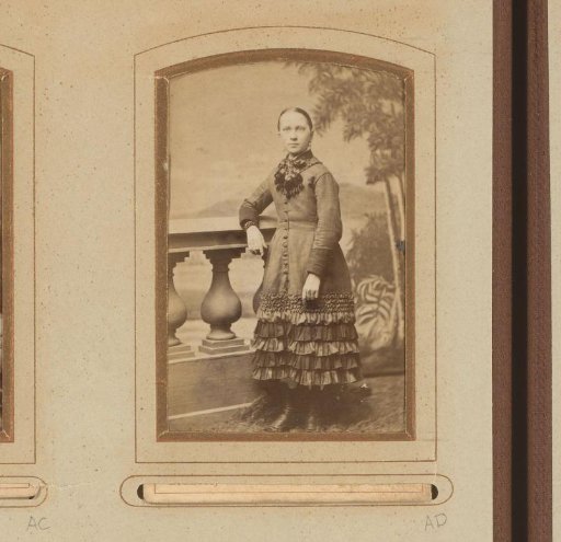 Portrait of a Girl Standing by a Balustrade