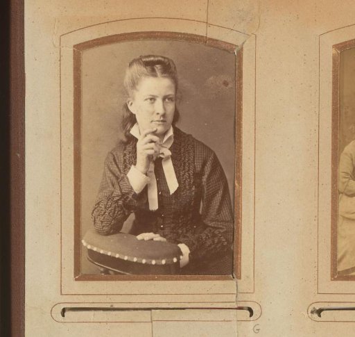 Portrait of a young sitting woman