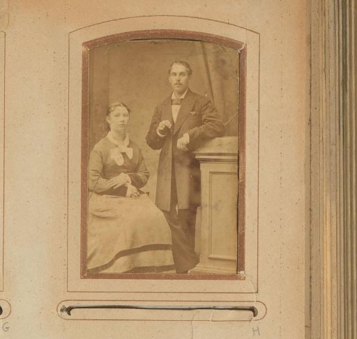 Portrait of a sitting woman and a standing man