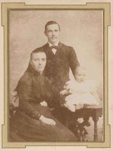 Portrait of a Man and a Woman with a Baby