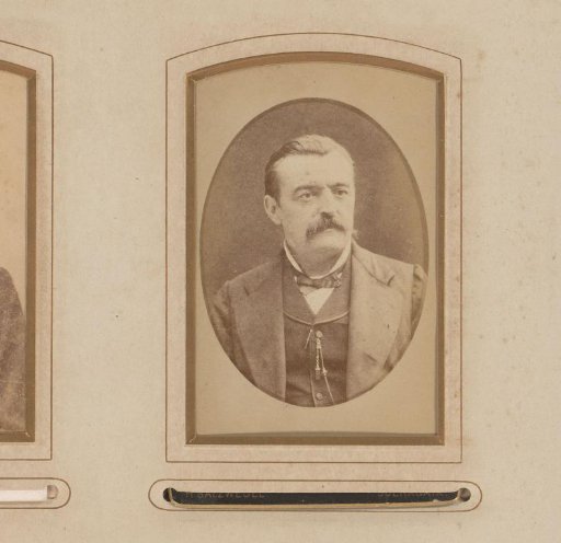 Portrait of a man with a moustache and a bow tie