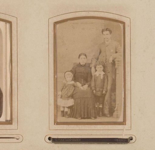 Family portrait of a seated woman, a standing man and two children