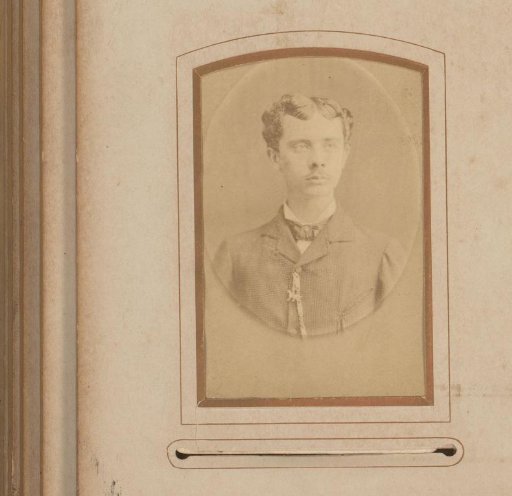 Portrait of a man with a mustache and a bow tie