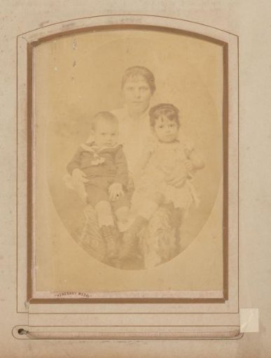 Portrait of a woman with two children