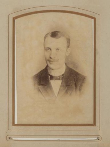 Portrait of a Man with Mustache and Bow Tie