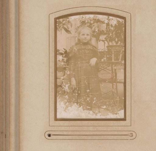 Portrait of a standing girl in an interior