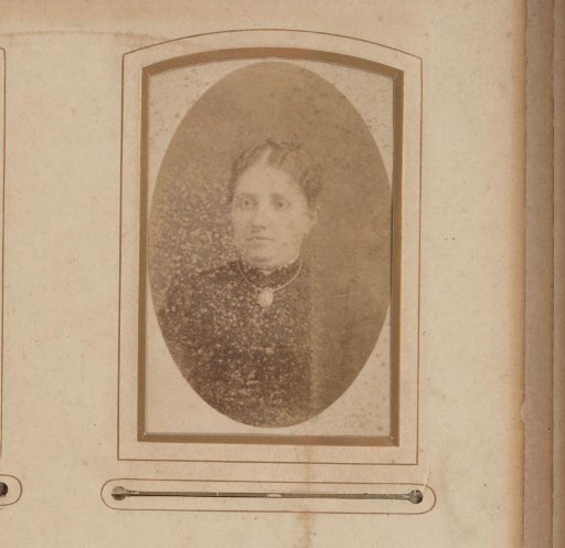 Portrait of a Woman with a Necklace Featuring a Medallion