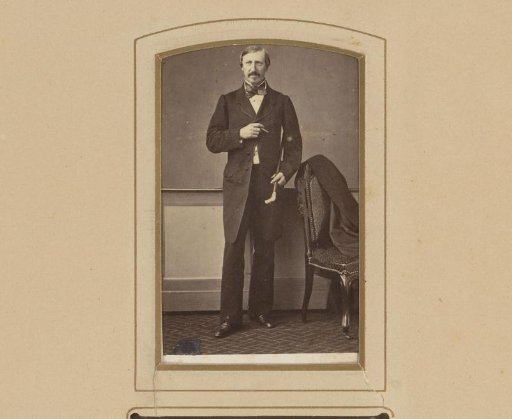 Portrait of a Standing Man with a Cigar in His Hand