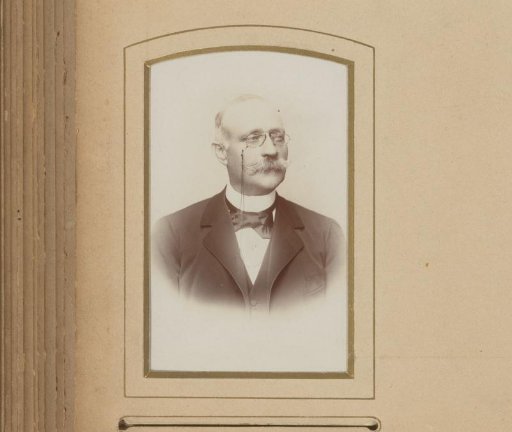Portrait of a Man with a Mustache and Spectacles