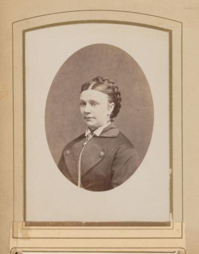Portrait of a Woman with Braided Hair and a Necklace