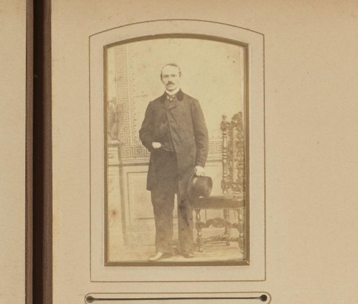 Portrait of a Standing Man with a Top Hat in His Hand