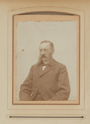 Portrait of a Seated Man with a Mustache and Sideburns