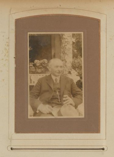 Portrait of a Man with a Cigar in His Hand, Seated in a Garden