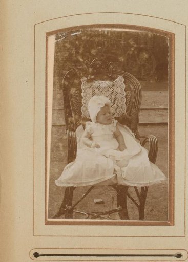 Portrait of a Seated Baby in a White Dress, Identified as Hulda Maria Petronella Geerten