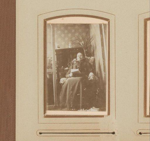 Portrait of a Woman with a Book in Her Hand, Seated in an Interior