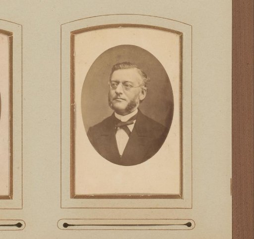Portrait of a man with sideburns and spectacles